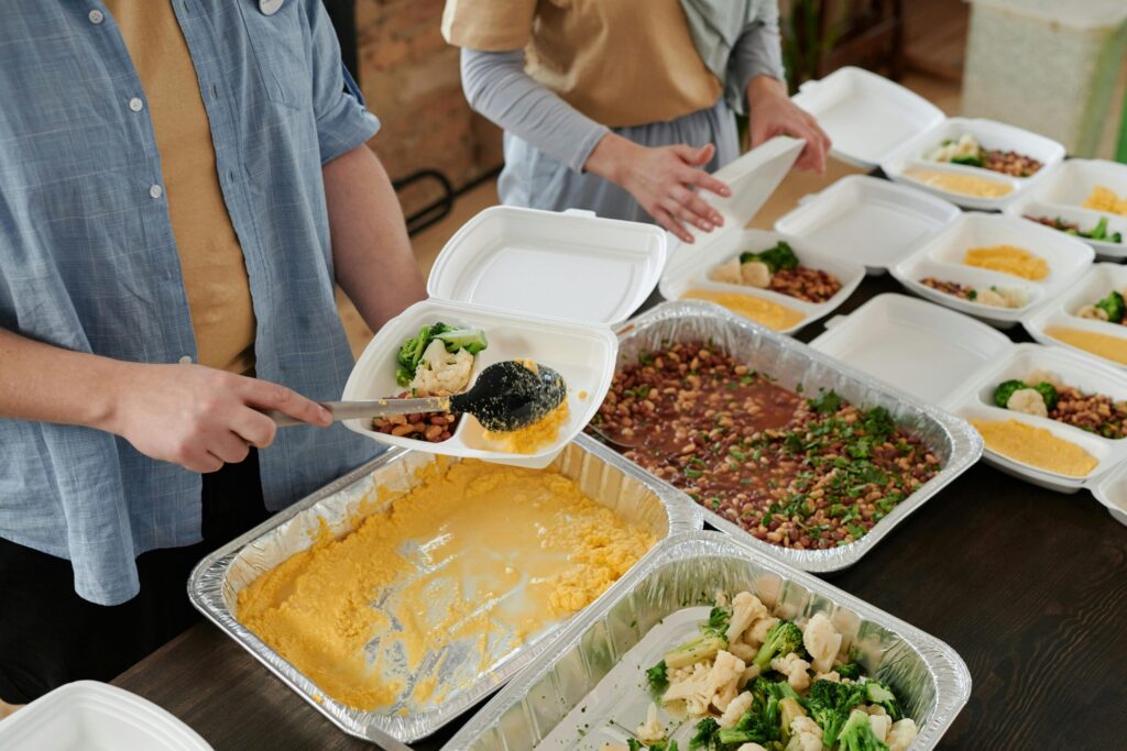 People Preparing Food Packs